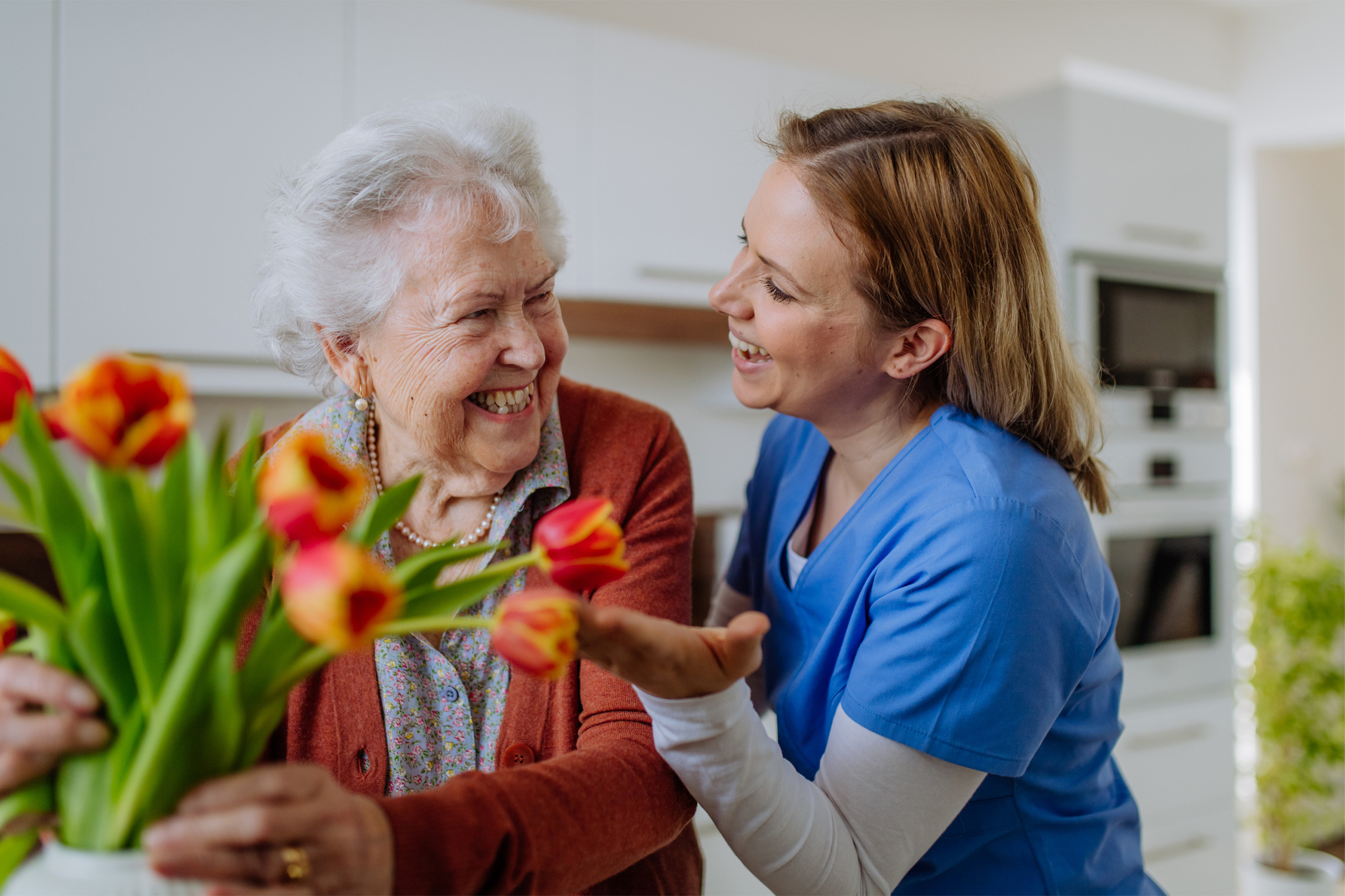 Skilled Nursing at Avon Oaks - senior and caregiver with flowers